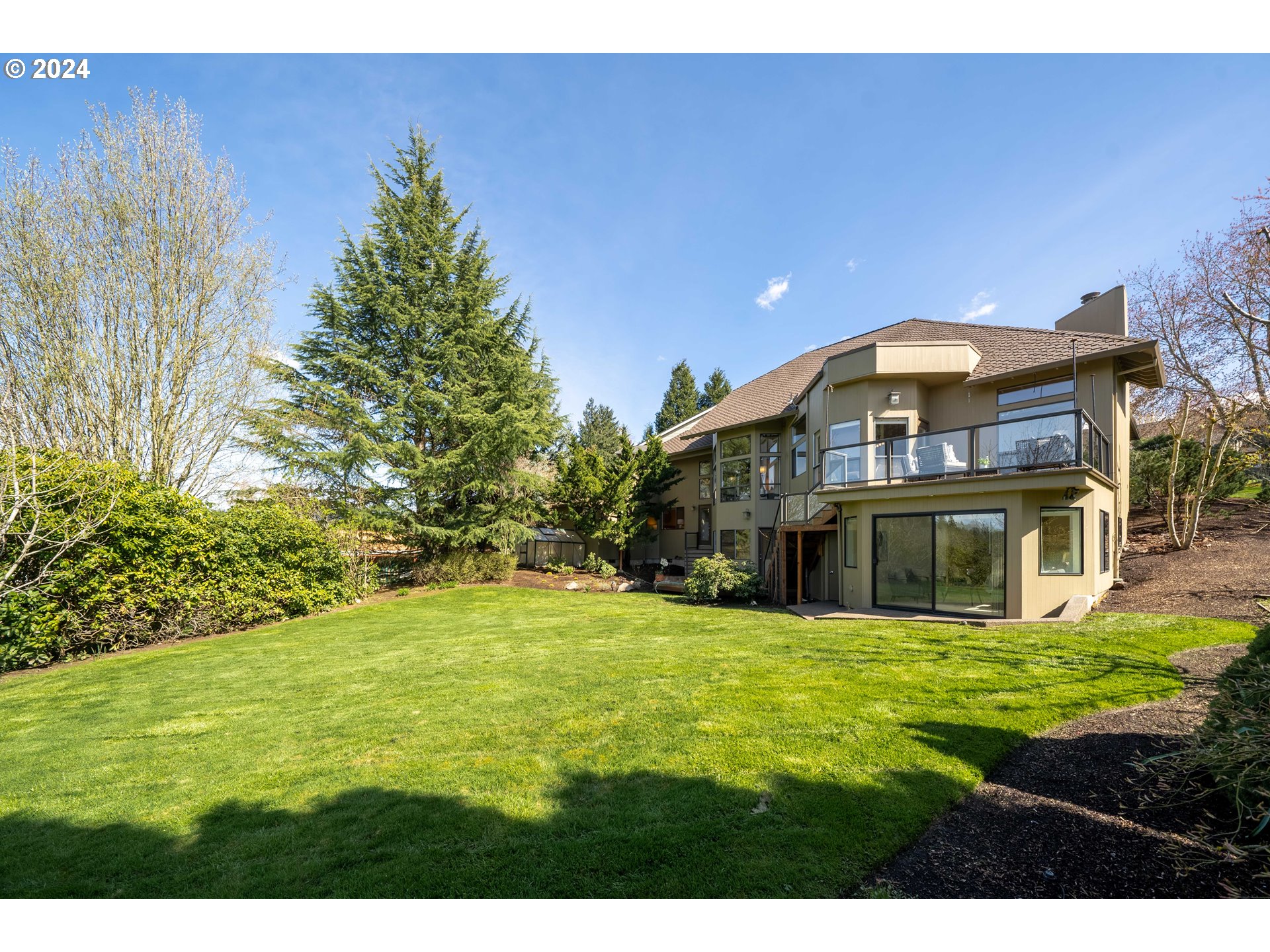 7179 Southwest Arranmore Way Portland, OR 97223 - Photo 43 of 48 a view of an house with a big yard