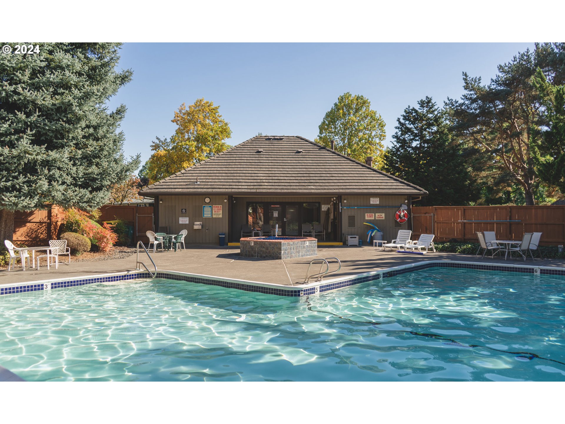 7179 Southwest Arranmore Way Portland, OR 97223 - Photo 47 of 48 a view of a house with swimming pool and sitting area