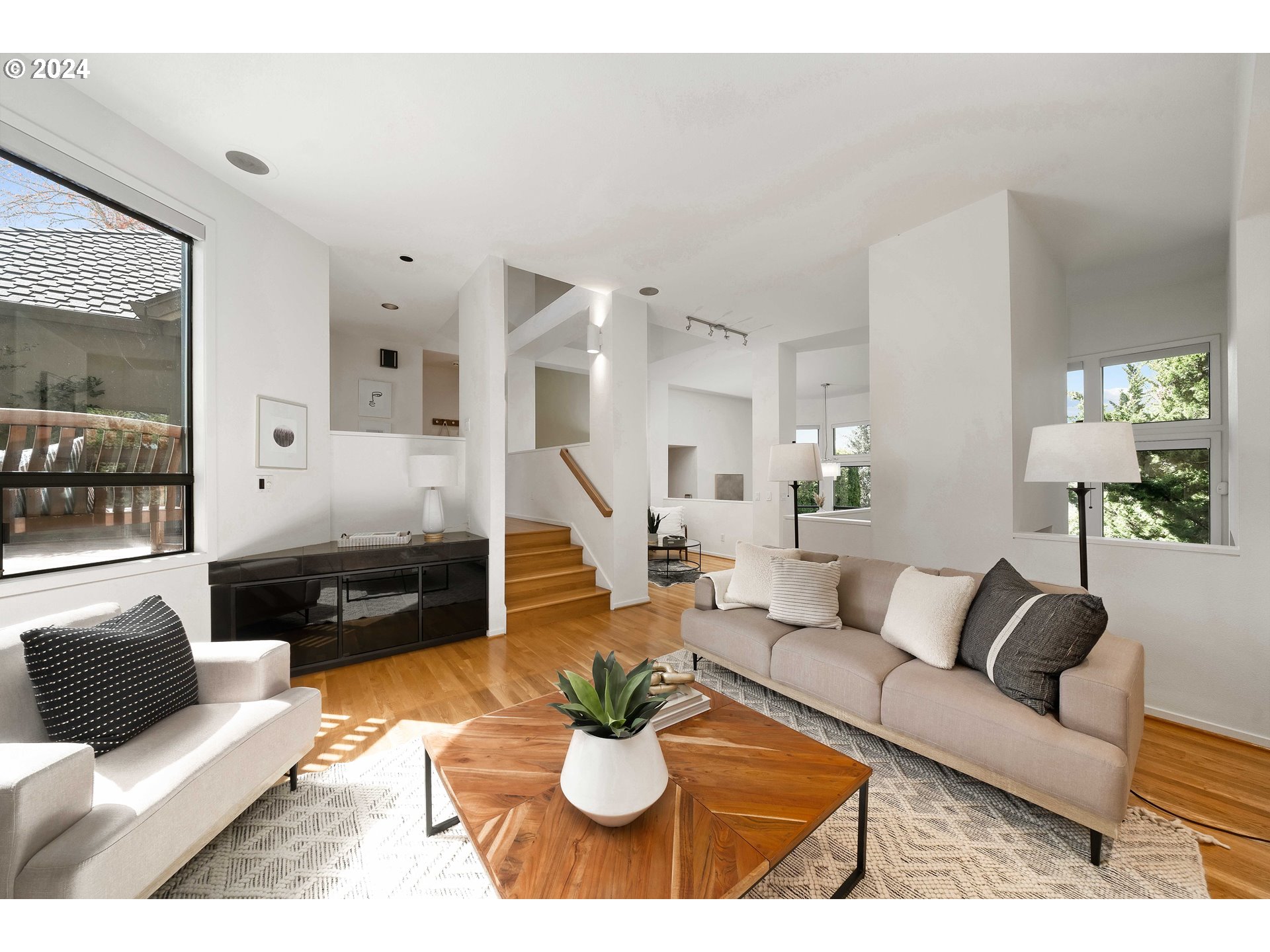 7179 Southwest Arranmore Way Portland, OR 97223 - Photo 5 of 48 a living room with furniture and a large window