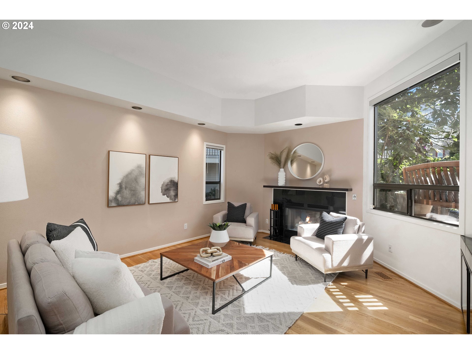 7179 Southwest Arranmore Way Portland, OR 97223 - Photo 6 of 48 a living room with furniture a rug and a large window