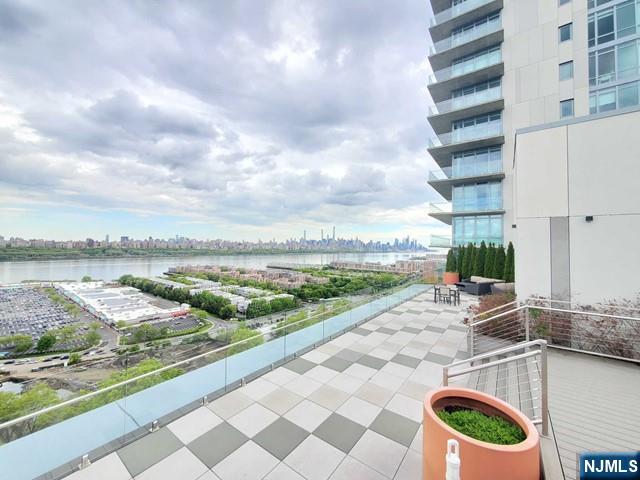 320 Adolphus Avenue, Unit 914 Cliffside Park, NJ 07010 - Photo 4 of 19 a view of swimming pool from a terrace