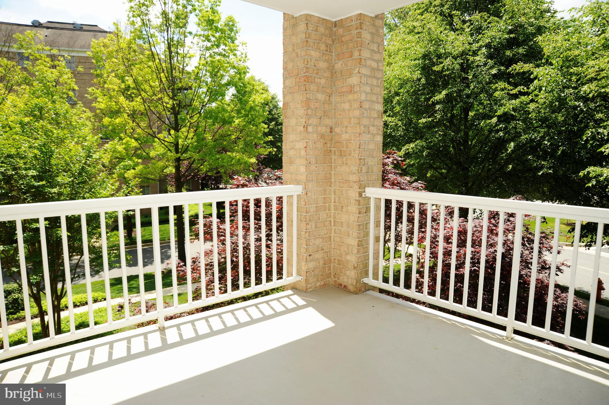 12320 Rosslare Ridge Road, Unit 207 Lutherville-Timonium, MD 21093 - Photo 28 of 30 Views of trees and walking trail on 2 sides