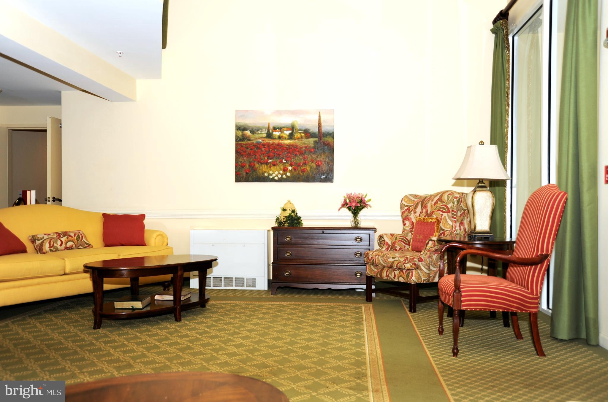 12320 Rosslare Ridge Road, Unit 207 Lutherville-Timonium, MD 21093 - Photo 4 of 30 Lobby to greet guests or have a social gathering