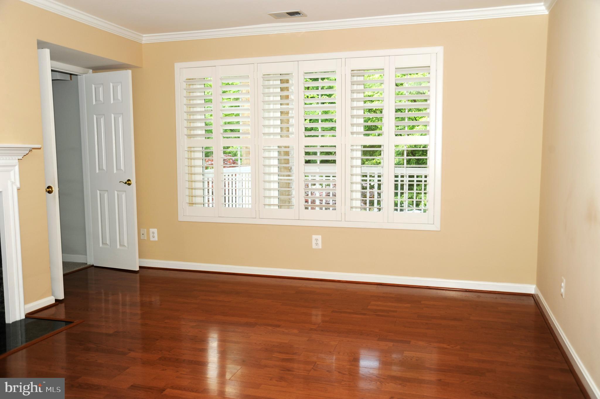 12320 Rosslare Ridge Road, Unit 207 Lutherville-Timonium, MD 21093 - Photo 10 of 30 Lots of natural sunlight from triple windows in LR