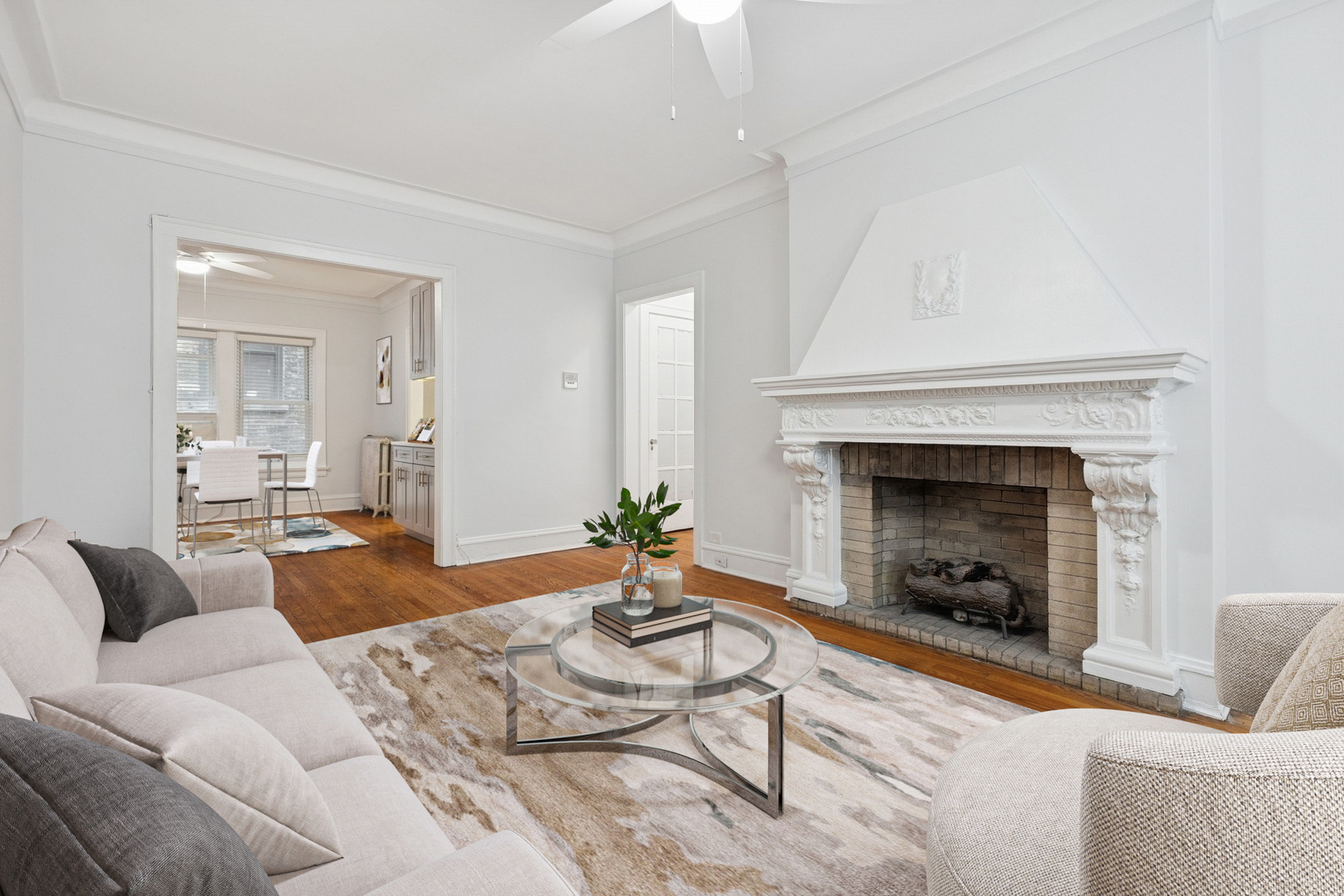 534 West Brompton Avenue, Unit 1N Chicago, IL 60657 - Photo 4 of 20 a living room with furniture and a fireplace