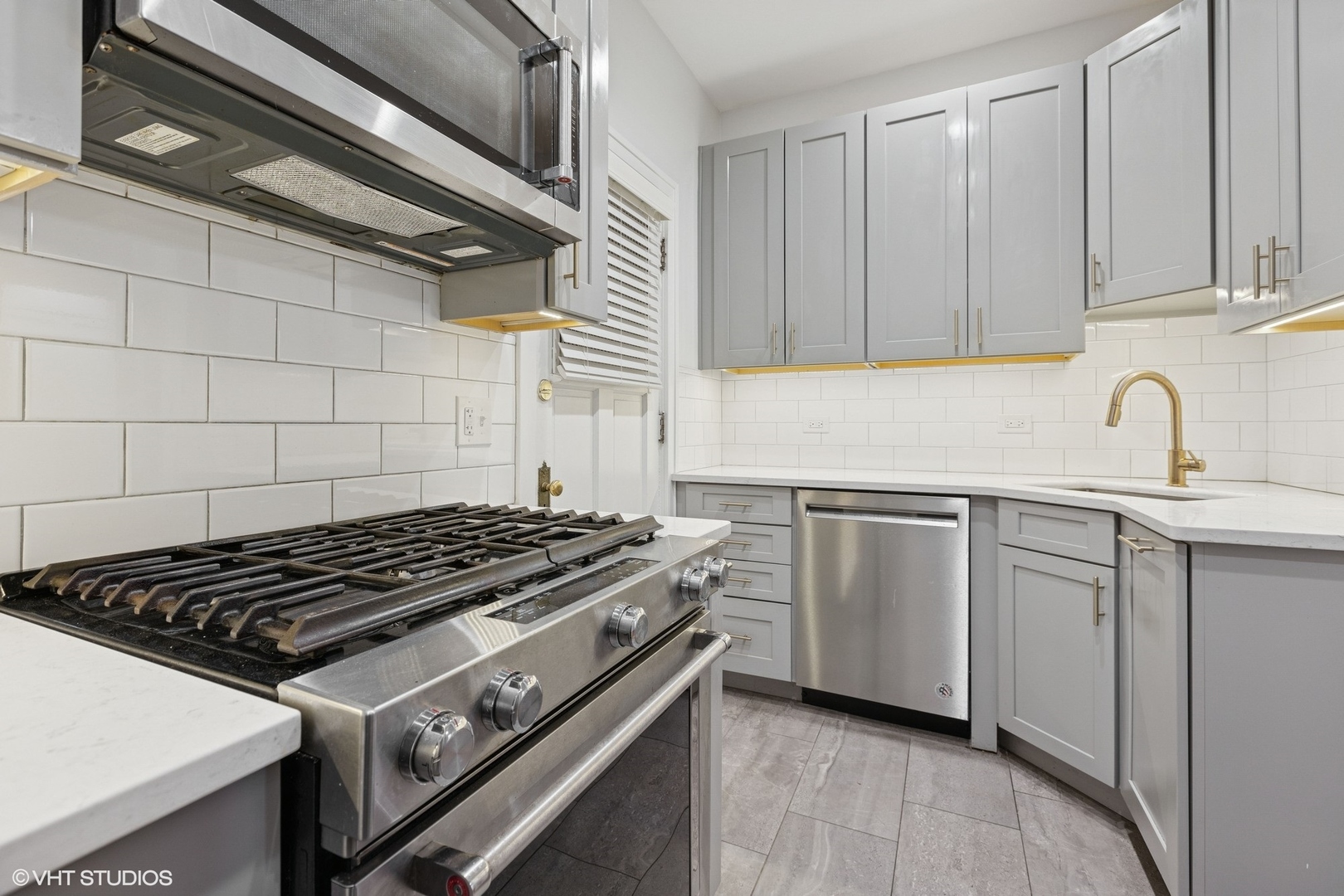 534 West Brompton Avenue, Unit 1N Chicago, IL 60657 - Photo 6 of 20 a white stove top oven sitting inside of a kitchen