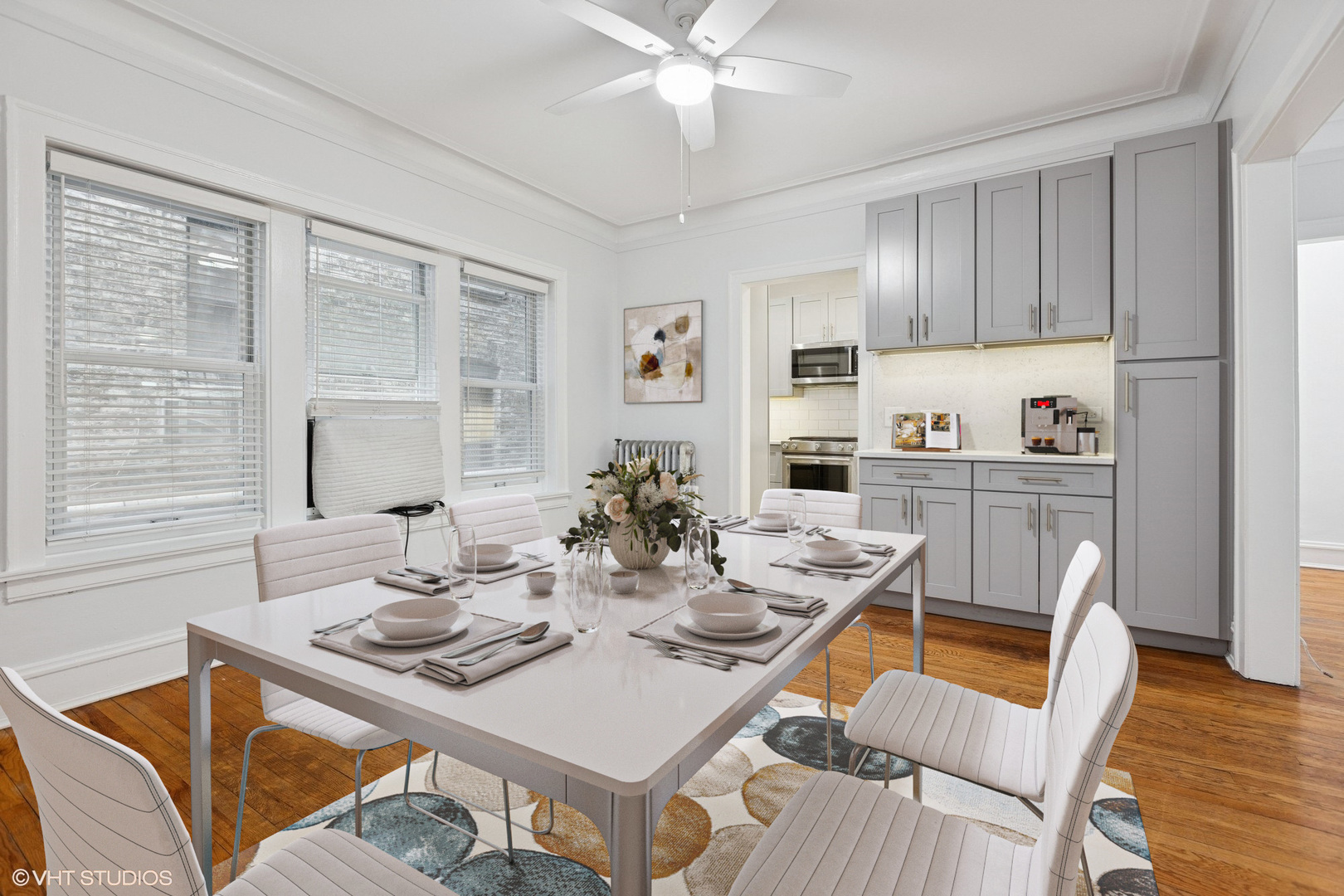 534 West Brompton Avenue, Unit 1N Chicago, IL 60657 - Photo 9 of 20 a view of a dining room with furniture window and wooden floor