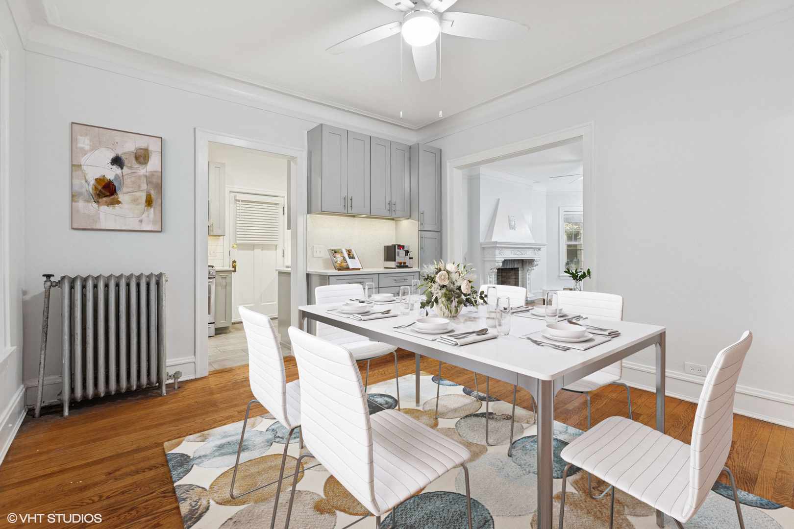 534 West Brompton Avenue, Unit 1N Chicago, IL 60657 - Photo 10 of 20 a view of a dining room with furniture and wooden floor