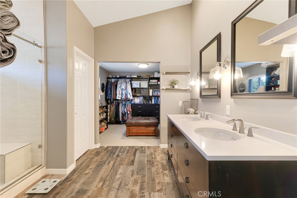 3843 San Gabriel Street Simi Valley, CA 93063 - Photo 34 of 52 a en suite bathroom with a double vanity sink and a mirror