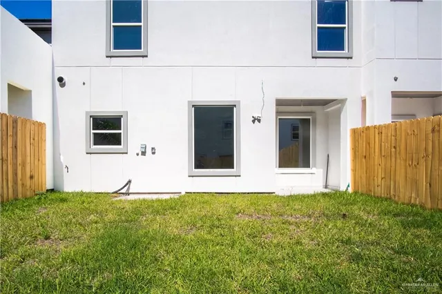 a view of building with yard