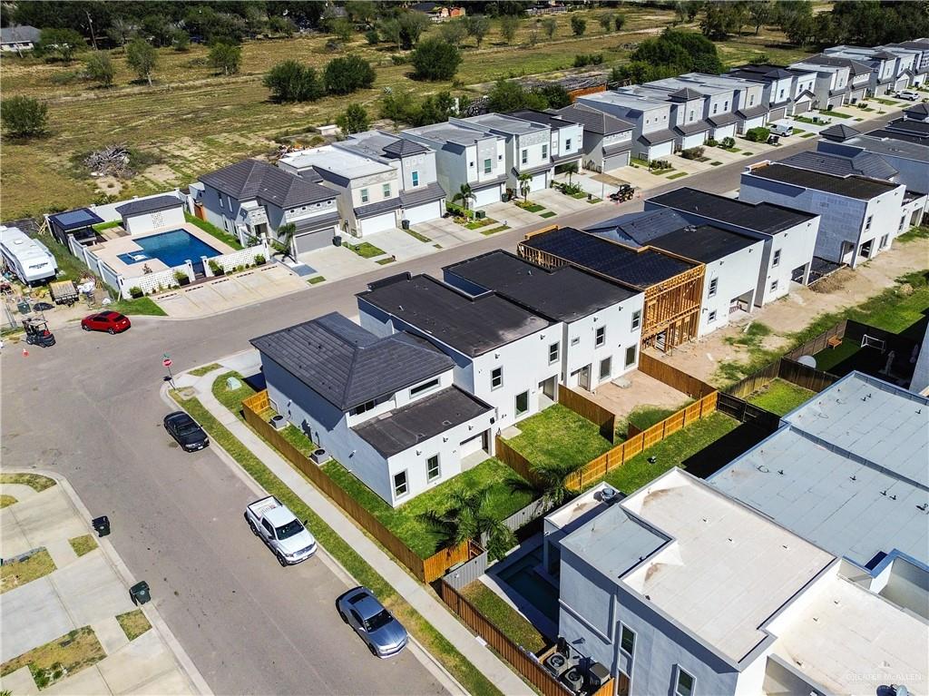 2204 Corales Street Mission, TX 78573 - Photo 24 of 30 an aerial view of a city with houses