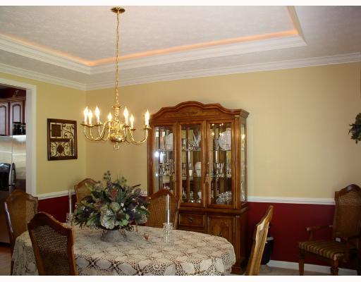 4236 Clendenning Road Gibsonia, PA 15044 - Photo 4 of 14 Dining Room. Lighted tray ceiling. Crown molding and chair-rail.
