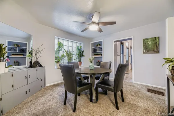 a view of a dining room with furniture