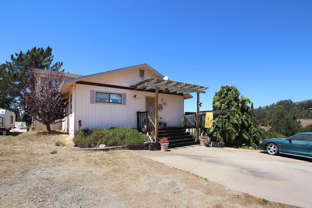 53 Valley View Road Watsonville, CA 95076 - Photo 1 of 38 a front view of a house with a yard