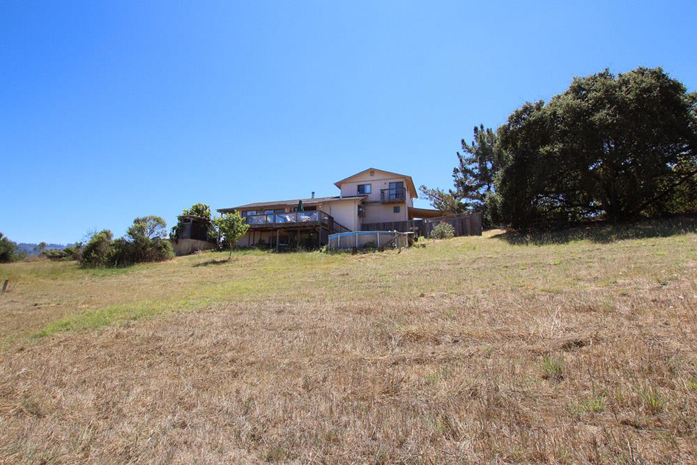 53 Valley View Road Watsonville, CA 95076 - Photo 17 of 38 a view of a yard with a house