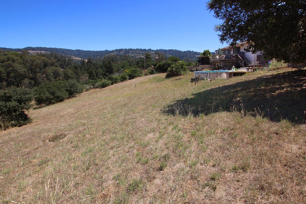 53 Valley View Road Watsonville, CA 95076 - Photo 20 of 38 a view of a yard with a mountain