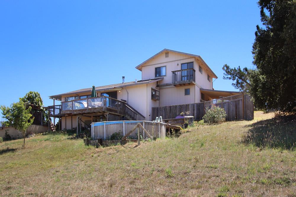 53 Valley View Road Watsonville, CA 95076 - Photo 2 of 38 a front view of a house with a yard