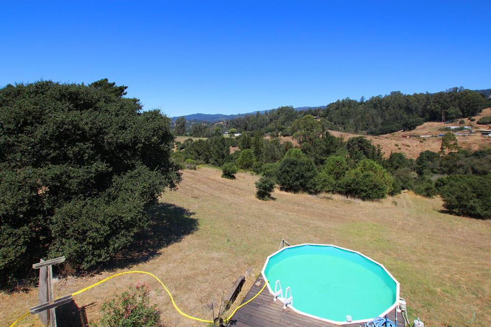 53 Valley View Road Watsonville, CA 95076 - Photo 29 of 38 a view of a swimming pool with a yard and outdoor seating