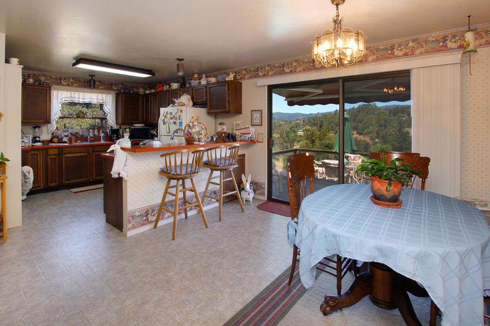 53 Valley View Road Watsonville, CA 95076 - Photo 3 of 38 a view of a dining room with furniture wooden floor and chandelier