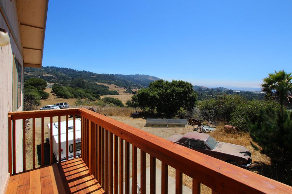 53 Valley View Road Watsonville, CA 95076 - Photo 33 of 38 a view of a balcony with wooden fence and floor