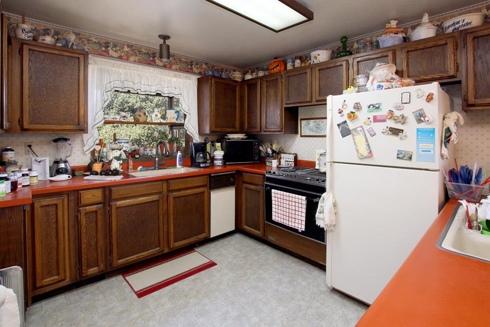 53 Valley View Road Watsonville, CA 95076 - Photo 5 of 38 a kitchen with stainless steel appliances a stove a sink and a refrigerator