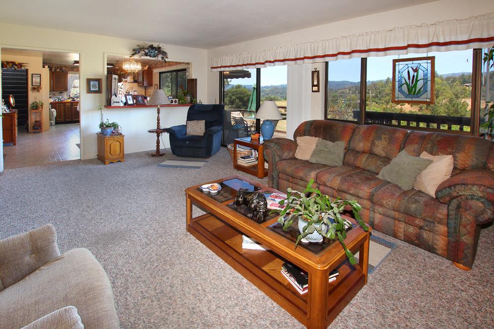 53 Valley View Road Watsonville, CA 95076 - Photo 6 of 38 a living room with furniture and a large window