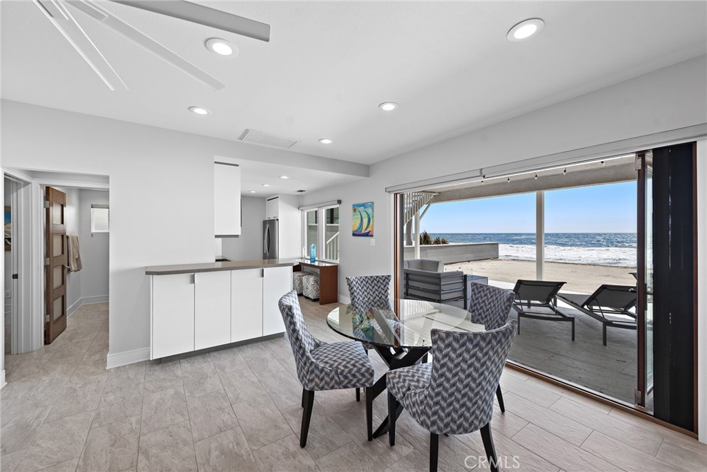 35585 Beach Road Dana Point, CA 92624 - Photo 11 of 43 a view of a dining room with furniture window and outside view