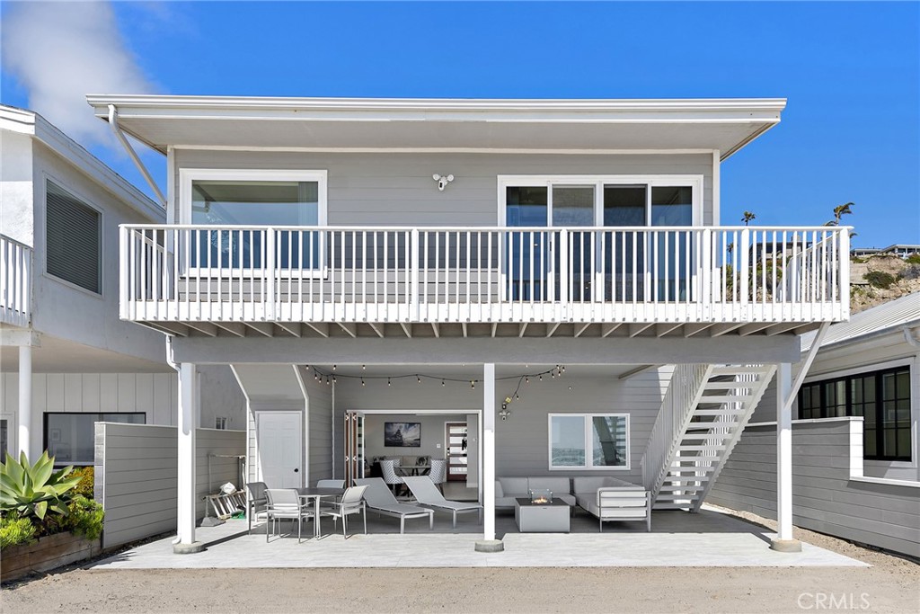 35585 Beach Road Dana Point, CA 92624 - Photo 17 of 43 a front view of a house with a porch