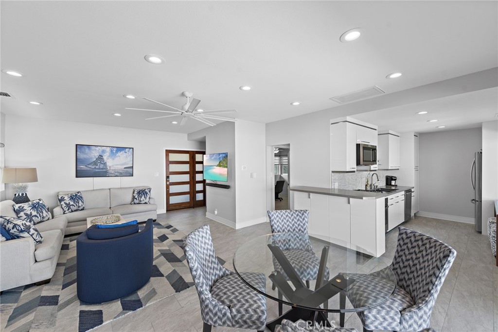 35585 Beach Road Dana Point, CA 92624 - Photo 18 of 43 a living room with furniture and kitchen view