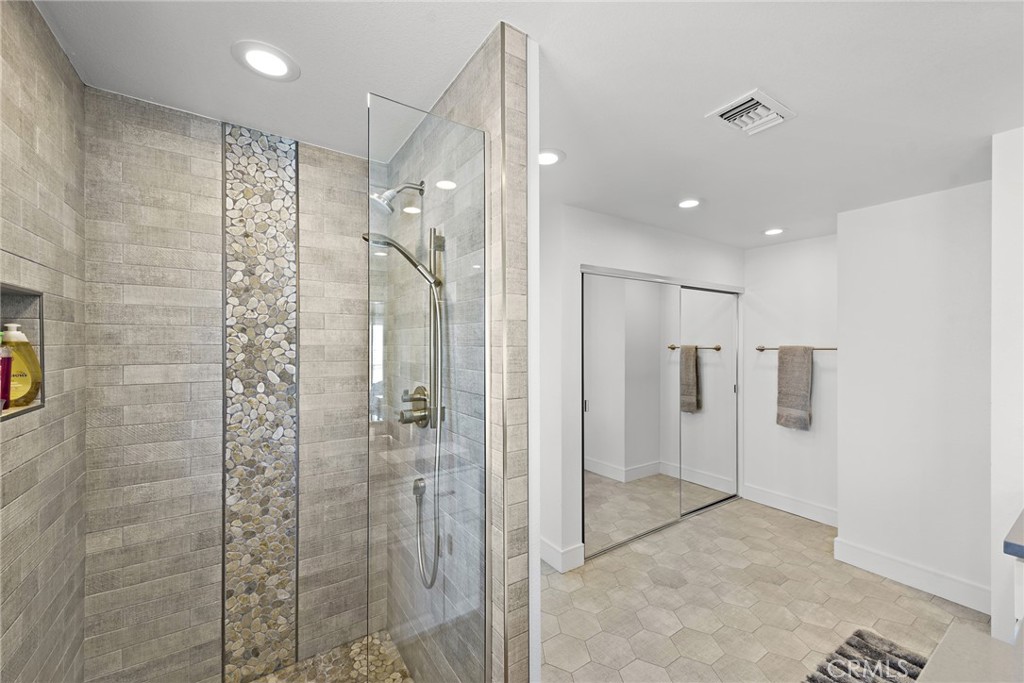 35585 Beach Road Dana Point, CA 92624 - Photo 28 of 43 a bathroom with a shower and a glass door
