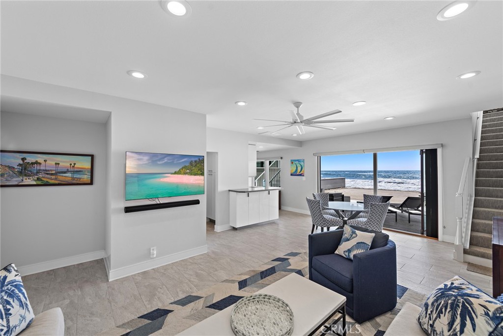 35585 Beach Road Dana Point, CA 92624 - Photo 10 of 43 a living room with furniture and a flat screen tv