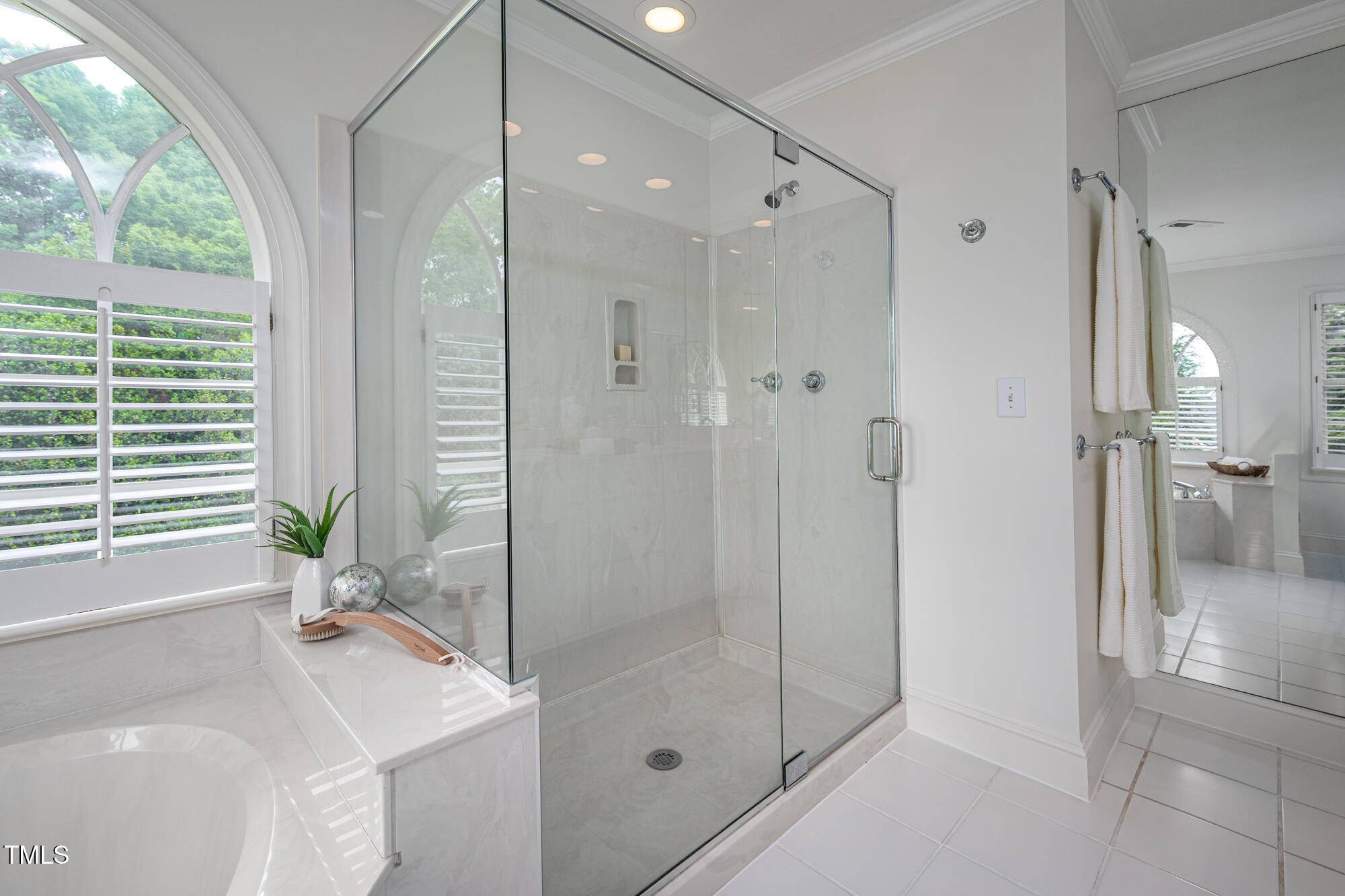 10 Twinleaf Place Durham, NC 27705 - Photo 19 of 39 a bathroom with a shower and a sink