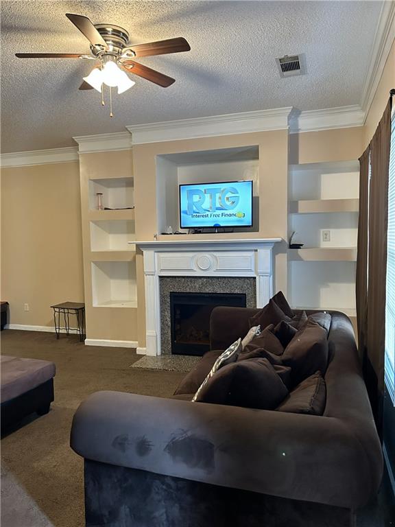 6354 Olmadison Place Atlanta, GA 30349 - Photo 6 of 8 a living room with furniture and a fireplace