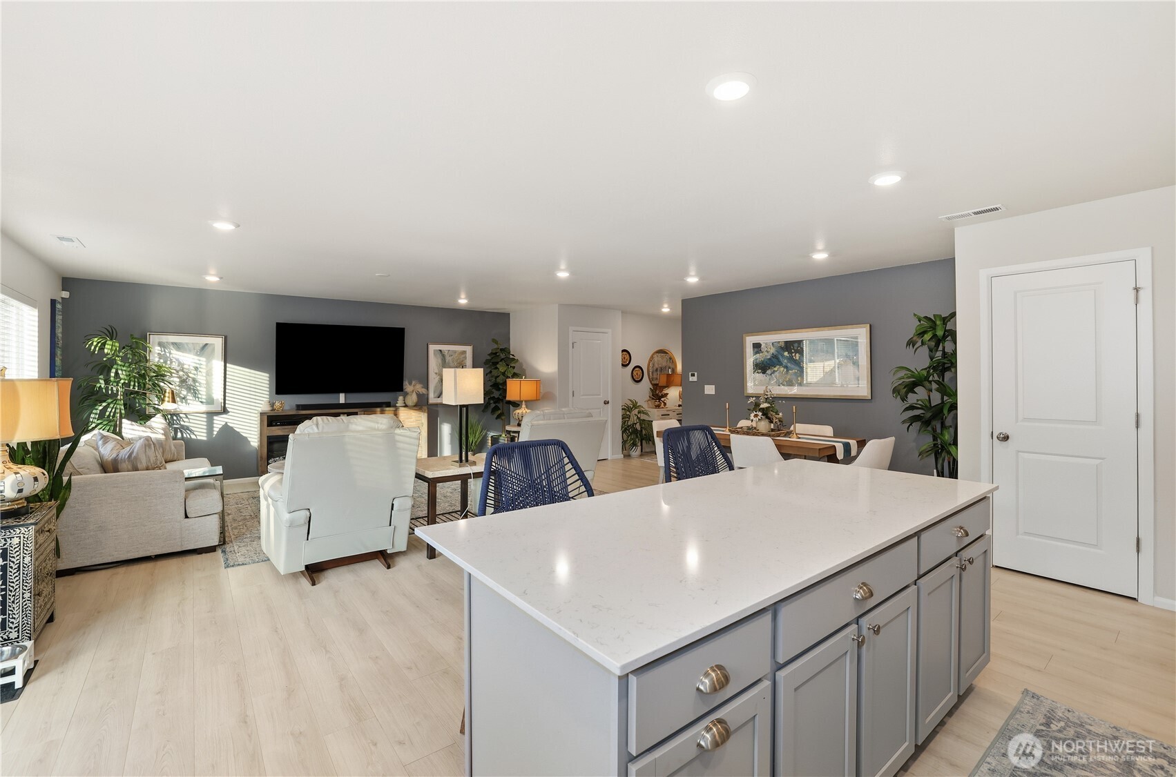 19908 135th Avenue East Graham, WA 98338 - Photo 9 of 39 a view of kitchen island with stainless steel appliances