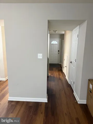 a view of room and wooden floor