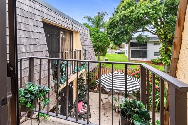 a view of a swimming pool with a yard
