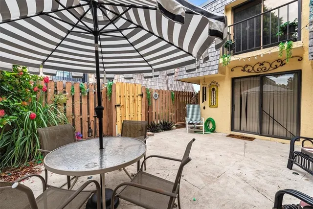 a view of a pathway with plants