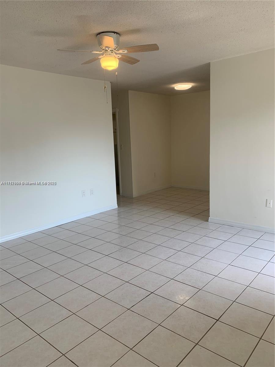 1395 Northeast 167th Street, Unit 209 Miami, FL 33162 - Photo 16 of 28 a view of empty room