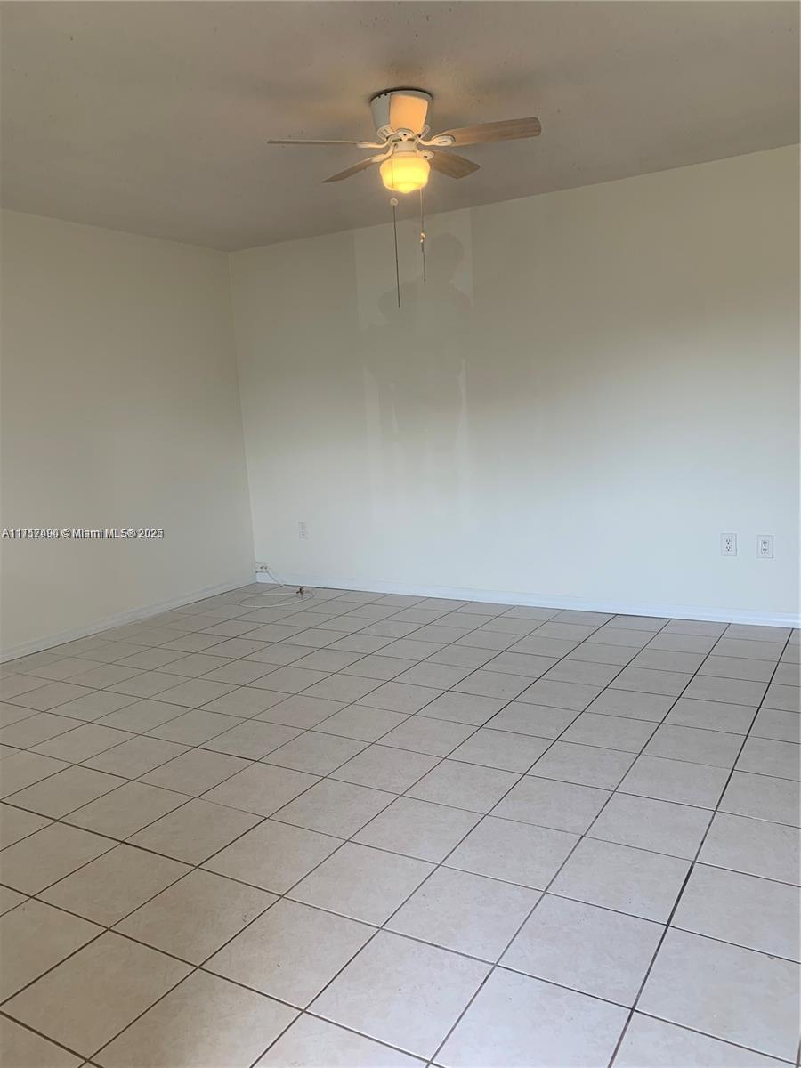 1395 Northeast 167th Street, Unit 209 Miami, FL 33162 - Photo 17 of 28 a view of an empty room