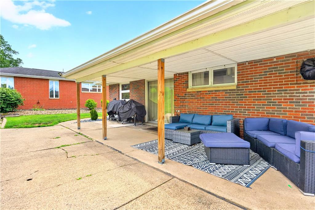 1642 Rostraver Road Belle Vernon, PA 15012 - Photo 25 of 32 a outdoor space with patio couches and a potted plant
