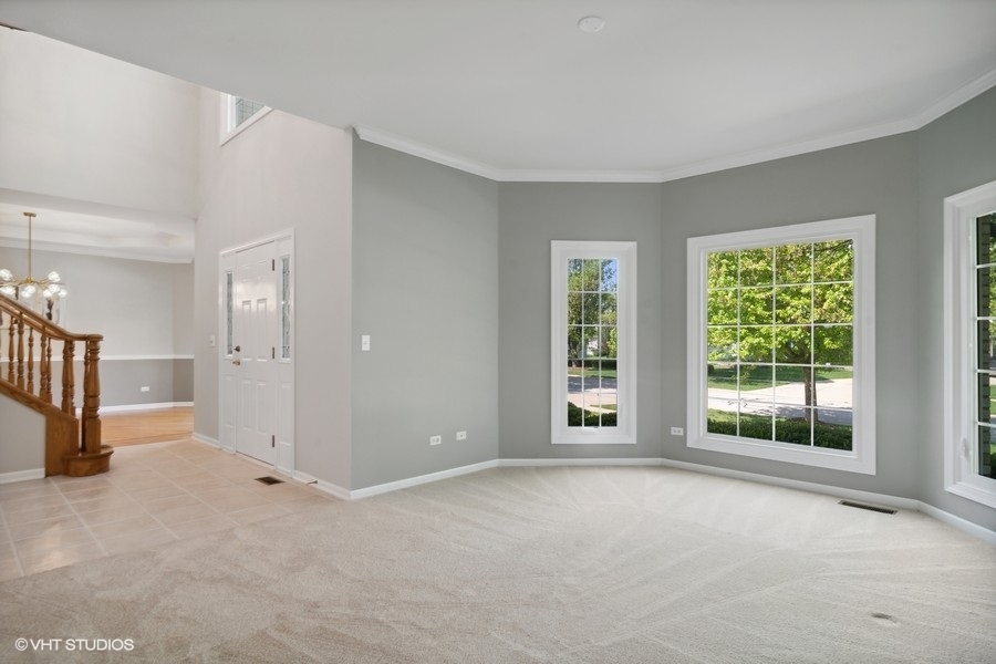 2616 Wendy Road Naperville, IL 60565 - Photo 4 of 29 a view of an empty room with a window