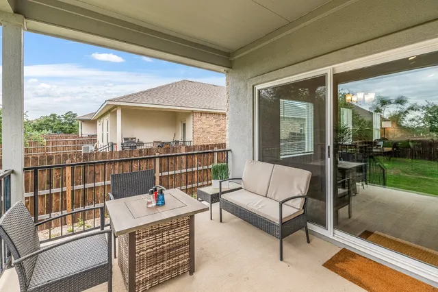 a living room with a rug