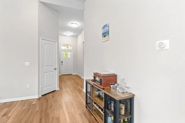 a view of a hallway with workspace