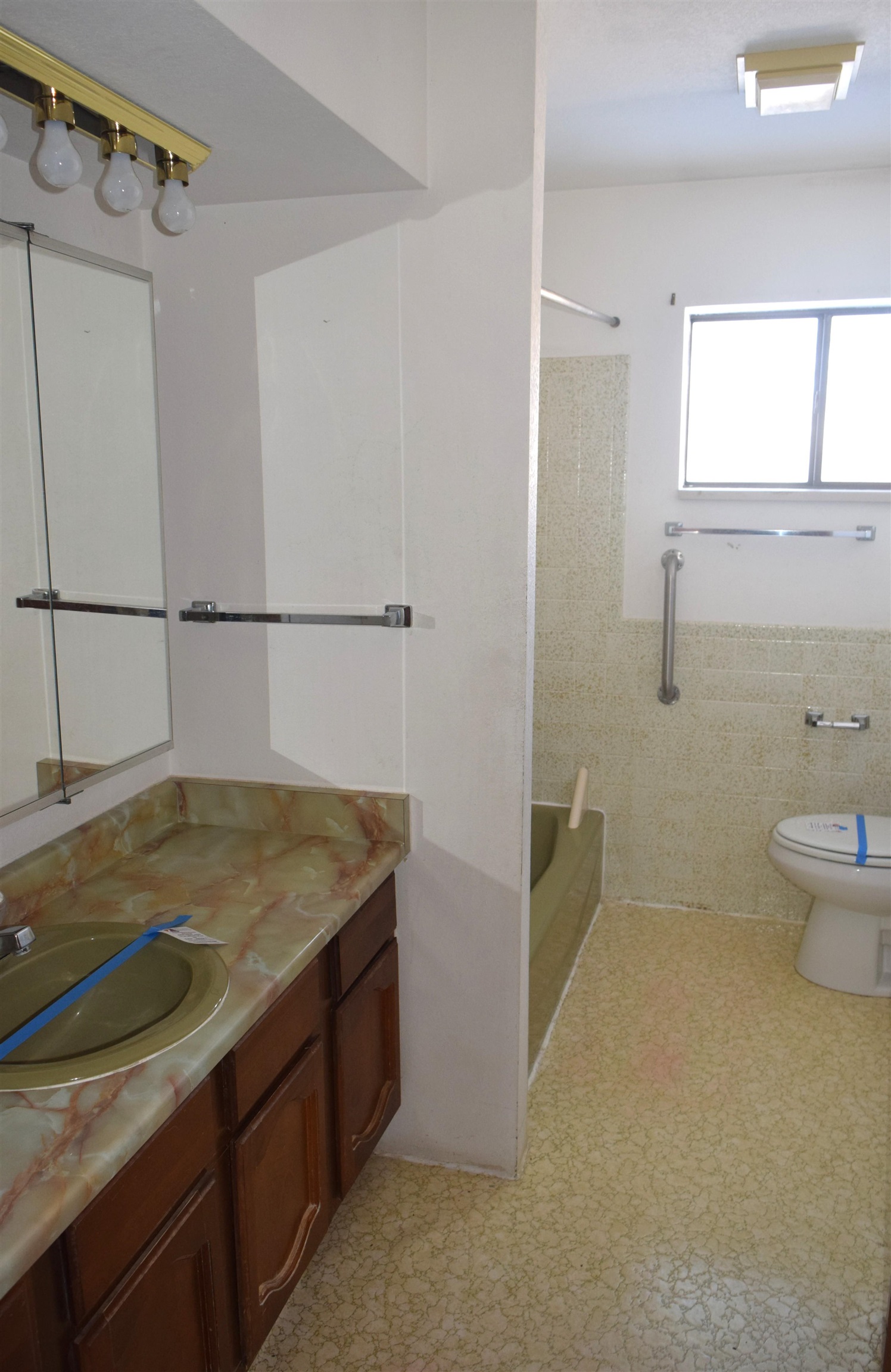 4399 44 Road De Beque, CO 81630 - Photo 15 of 31 a bathroom with a granite countertop sink and a mirror