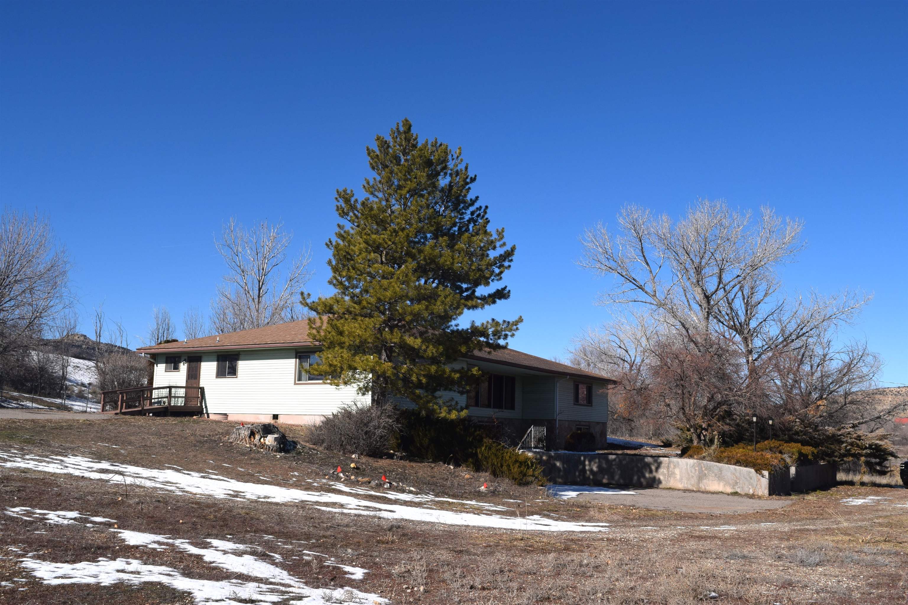 4399 44 Road De Beque, CO 81630 - Photo 23 of 31 a street view with residential house