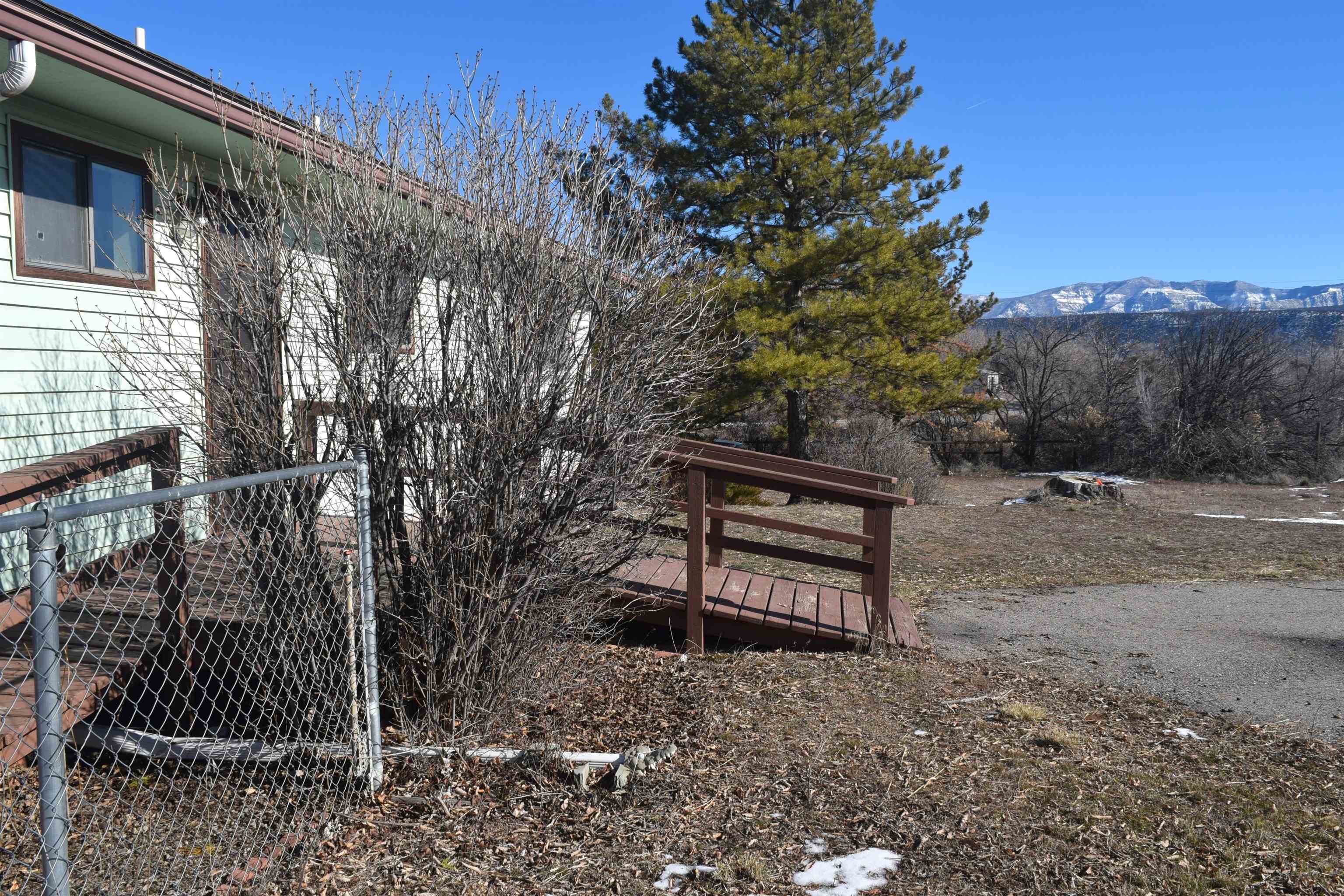 4399 44 Road De Beque, CO 81630 - Photo 30 of 31 a view of a bench in a backyard