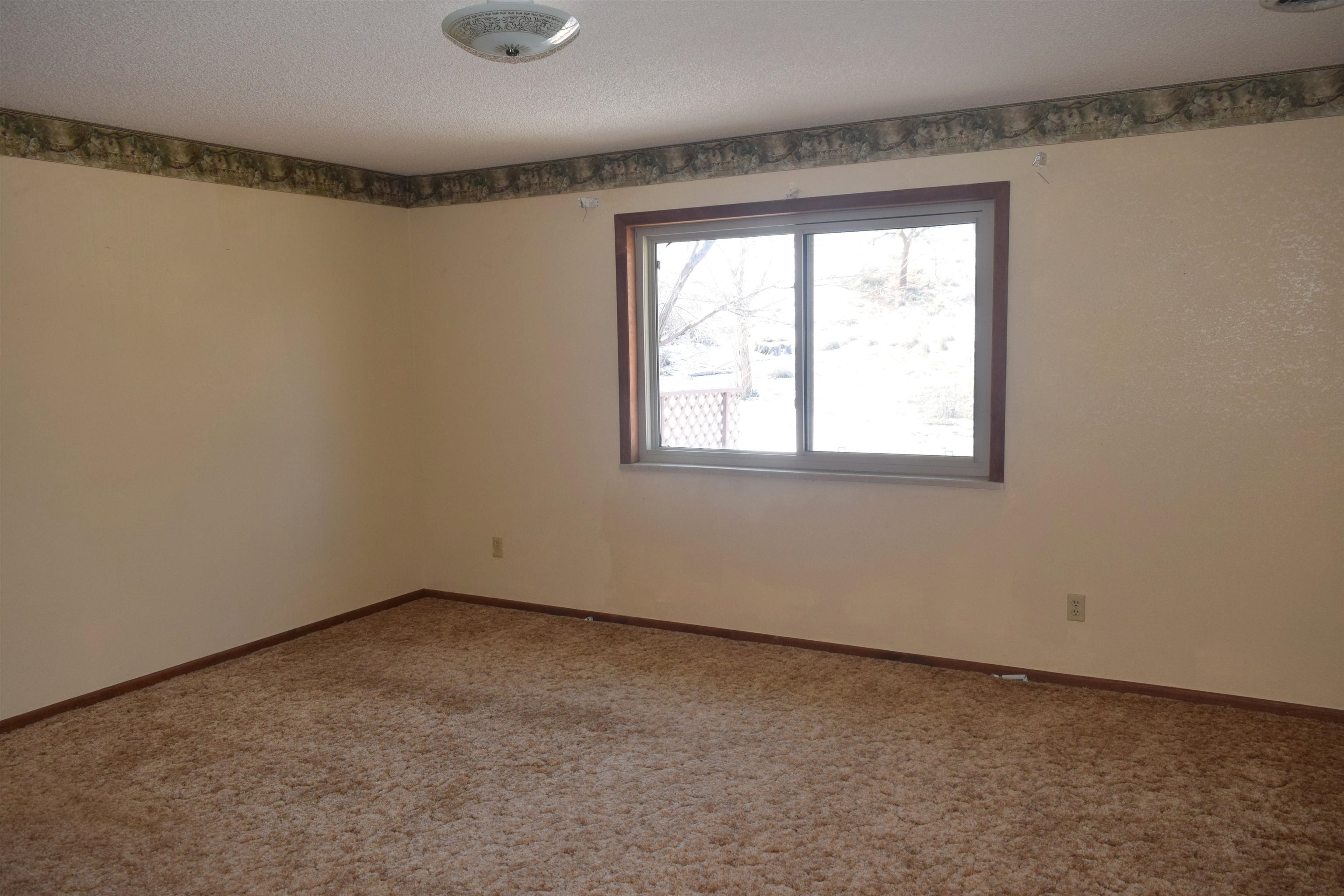 4399 44 Road De Beque, CO 81630 - Photo 10 of 31 an empty room with a window