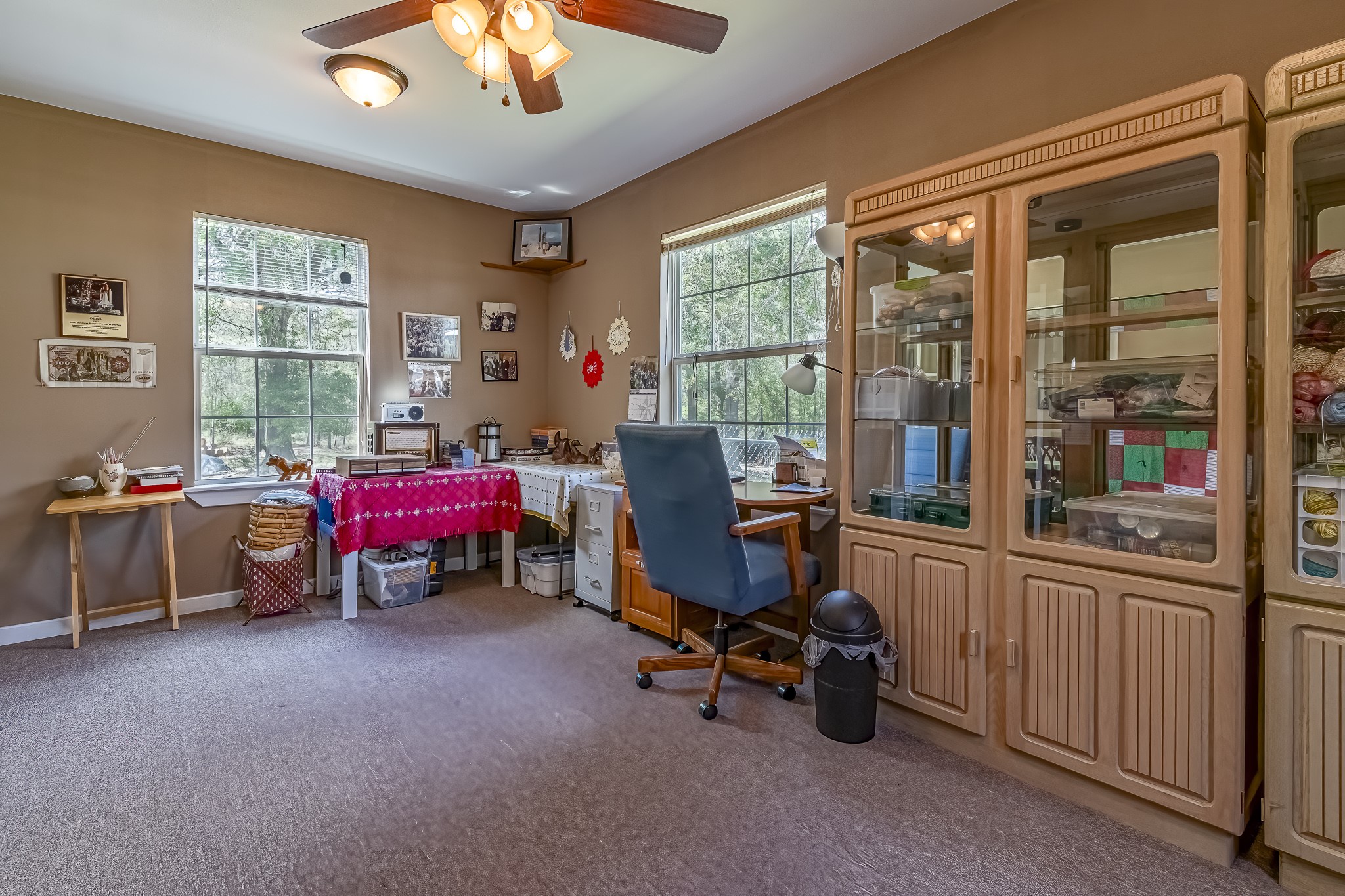 188 Pullin Road Corrigan, TX 75939 - Photo 12 of 50 a view of a workspace with furniture and a window