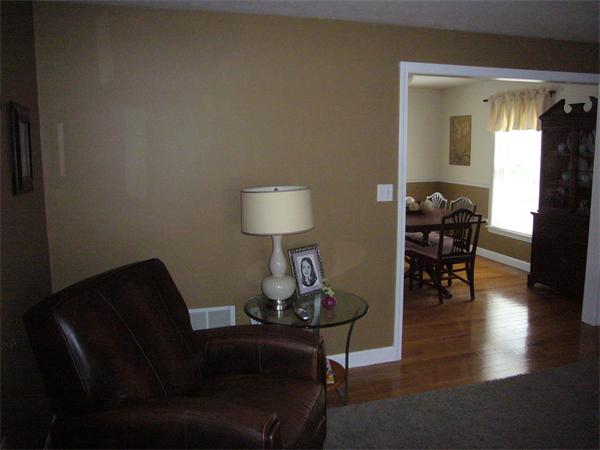 32 Stonegate Road Chelmsford, MA 01824 - Photo 5 of 20 a living room with furniture and a table