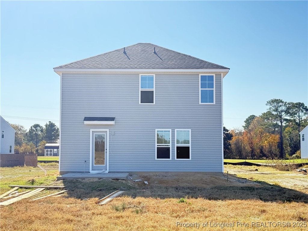 188 Buggy Top Lane Autryville, NC 28318 - Photo 2 of 12 a front view of a house with a yard